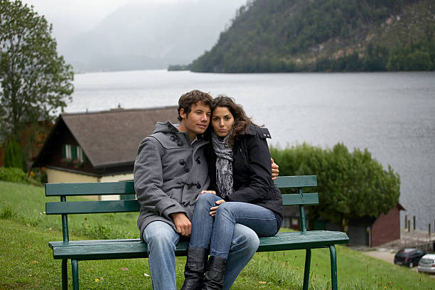 couple on bench in front of lake (Austria)image taken with Canon 5D MK II photographed at Minilypse in Bad Aussee (Austria)