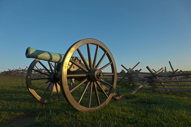 istock Sunlight Gleaming on a Cannon Standing Guard at Gettysburg Battlefield 183056061