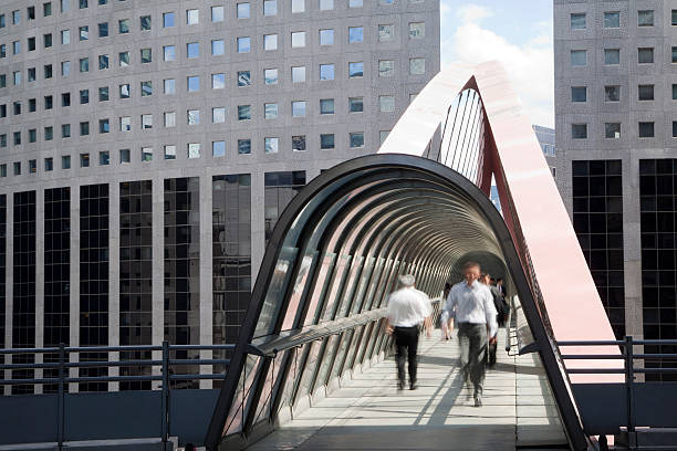 istock Businessmen Walking Along an Elevated Walkway, La Defense, Paris 183056333