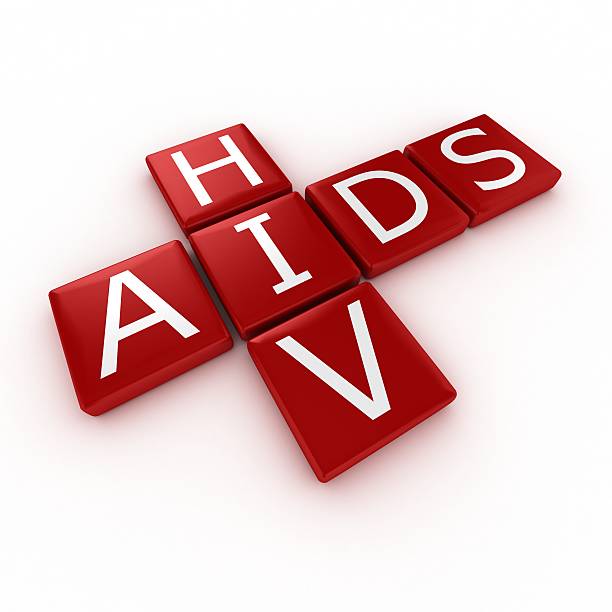 HIV and AIDS spelled out in red blocks stock photo