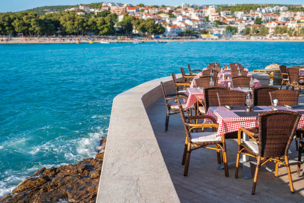 istock The interior of an open-air restaurant on the seashore. 1830572255