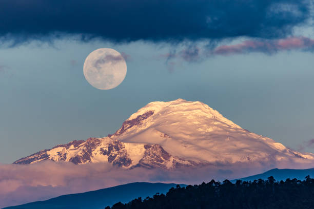 istock Cayambe volcano with the moon 1830572830