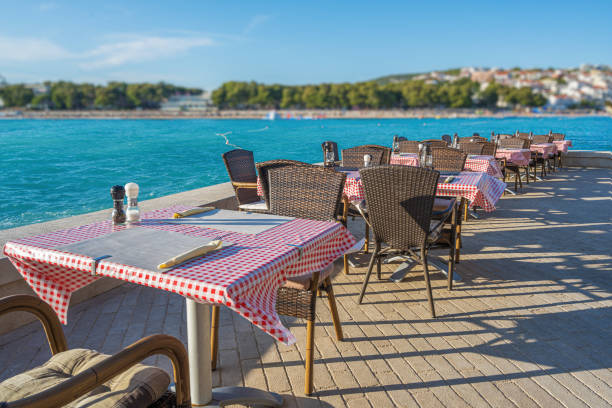 istock The interior of an open-air restaurant on the seashore. 1830573885