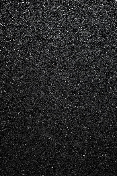 istock a fresh layer of new hot asphalt 183057614