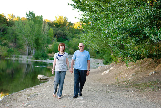 istock Walking happy senior couple 183057626