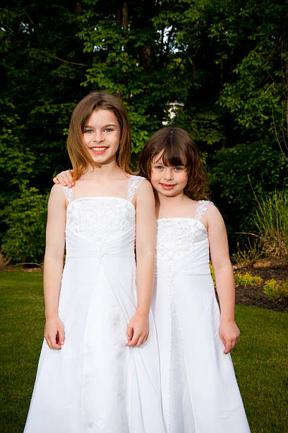 istock Young Girls in Brides Maid Dresses 183057799