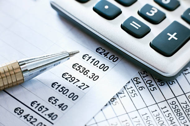 istock Pen and Calculator on a Fiscal Report 183057826