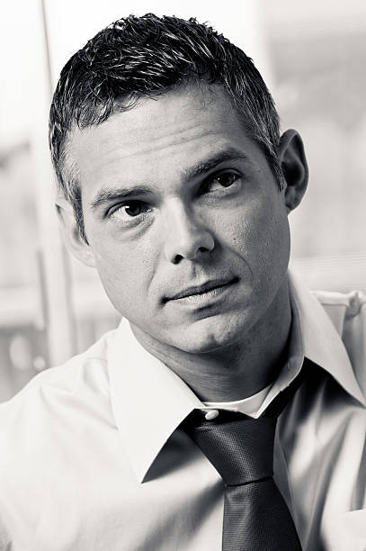 istock Confident young businessman with open collar 183057981