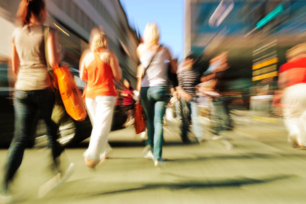 istock Young people crossing street, motion blur 183058740