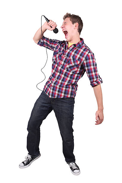 istock Isolated casual male screaming into microphone 183059258