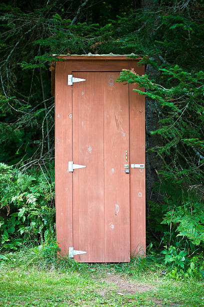 istock Outhouse in the Woods 183059679