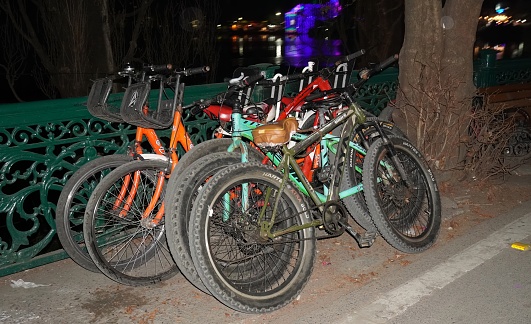 many bicycle stand one by one on road at night 30-11-2023, Nanital, Uttrakhand India
