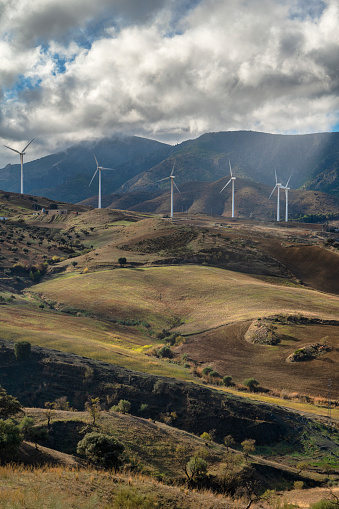 Beautiful wind turbine in the countryside . Wind Turbines Windmill Power Farm. Carratraca on the outskirts of Malaga, Spain.