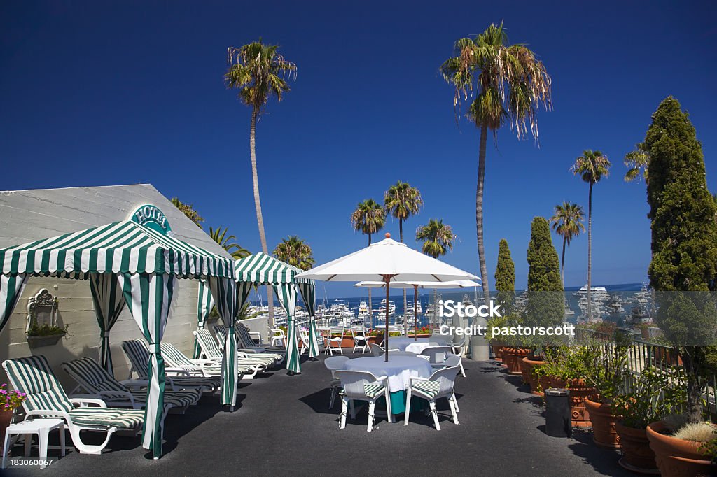 Avalon Tourist Resort Hotel Rooftop Rooftop of Tourist Resort hotel on Avalon has scenic view of harbor and boats at moorings California Stock Photo