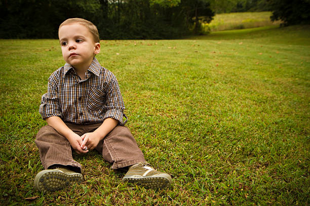 istock Sad Boy Looks Away 183060158