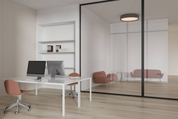 istock White and wooden office workplace with lounge area 1830608739