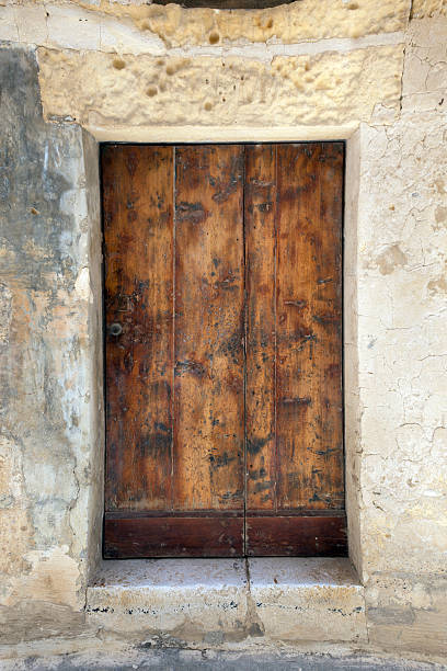 istock Old WOoden Door in Valetta Malta 183060915