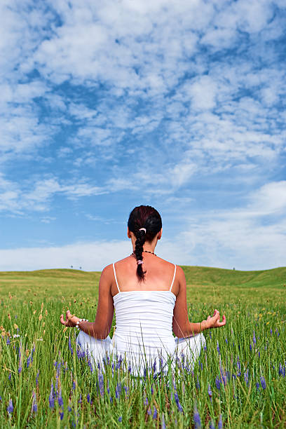 istock Young woman practicing yoga 183061289