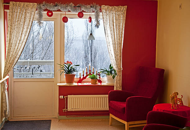 istock Cozy corner at Christmas with winter snow outside. 183061314