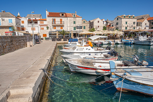 Primosten, Croatia - July 27, 2023: Fishing boats in Primosten old town port, Dalmatia, Croatia