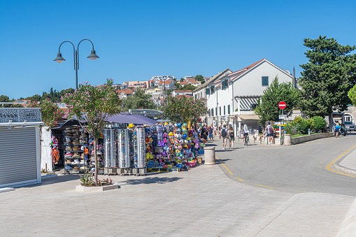Primosten, Croatia - July 27, 2023: Retail outlets and street souvenir shops in the resort town of Primosten, Croatia.