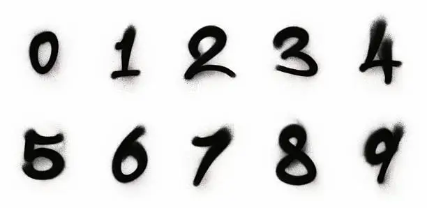 Numbers from 0 to 9 spray-painted on white with fine spray detail.