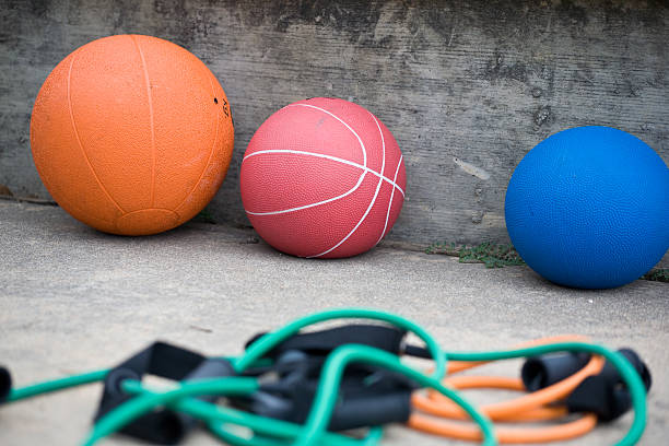 Medicine balls with ropes in many different colors stock photo