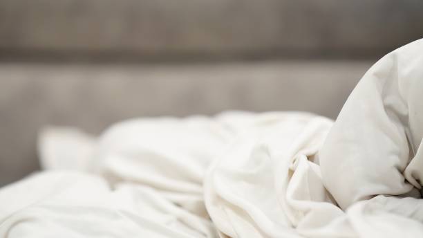 istock close up shot of white cloth with blur background 1830623342