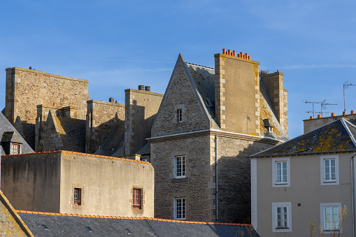Old building with chimney in Mont Saint-Malo , France