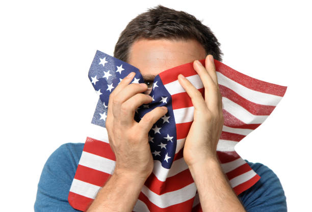 istock Man Hiding Face with US American Flag on White 183062696