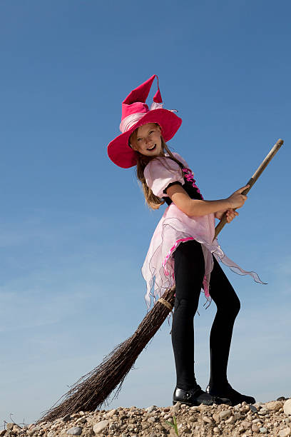 istock Happy Little Witch Riding a Broom 183062742