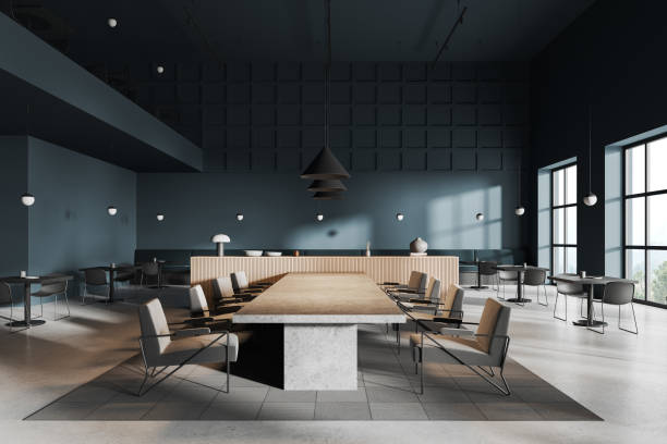 istock Dark stylish restaurant interior with table and chairs, panoramic window 1830627791