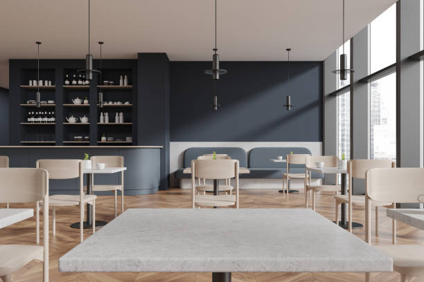 istock Modern cafe interior with seats and table, bar counter and panoramic window 1830628172