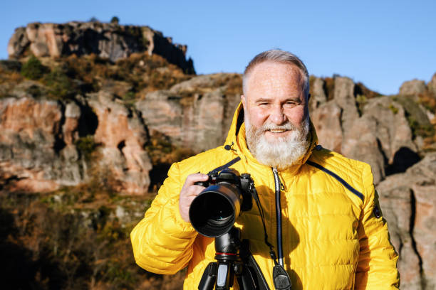 istock Mature photographer 1830628920