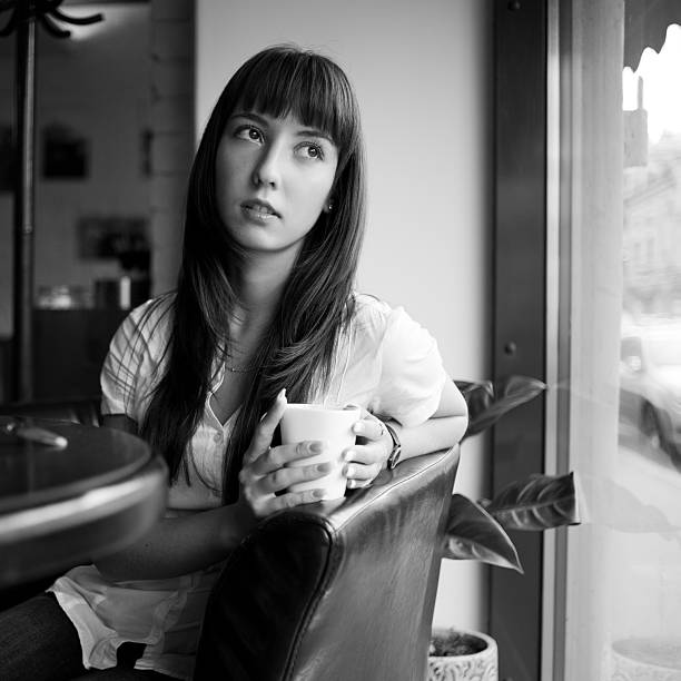 istock Girl in a cafe 183063125