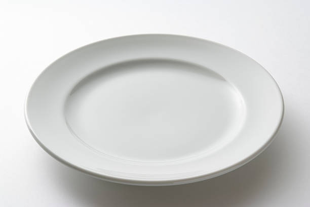 istock Isolated shot of white plate on white background 183063157