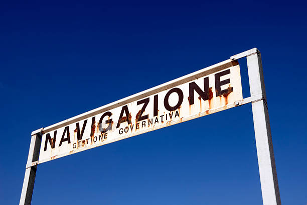 istock An old abandoned sign against a blue sky 183063979
