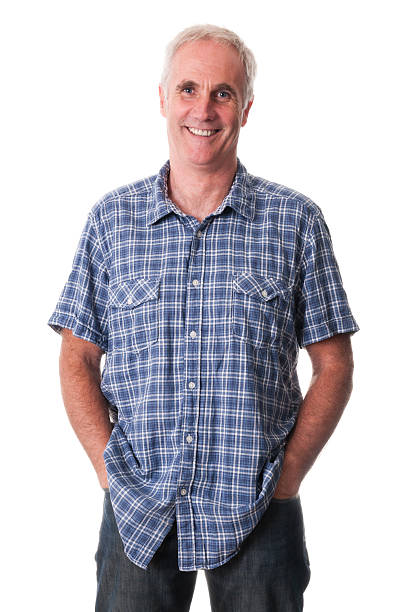istock smiling mature man with hands in pockets 183064025