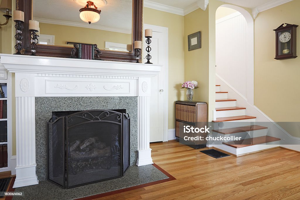 Beautiful Living Room Living Room with fireplace and stairs. Architecture Stock Photo