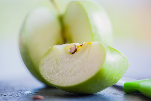 Green apple fruit in half