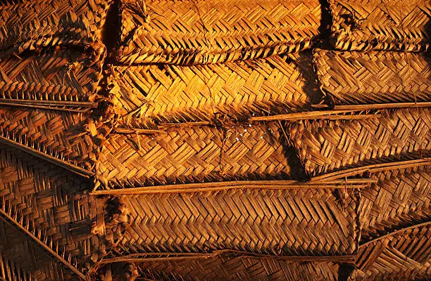 Woven shutters made from coconut fronds on a traditional Samoan fale.