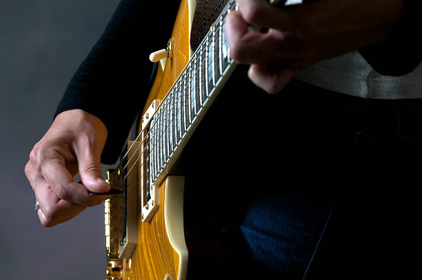 istock Electric Guitar Player Up Close 183064436