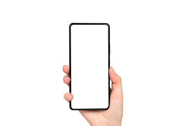 istock Woman's hand with a smartphone isolated on a white background. Close-up. 1830650282