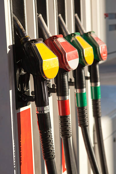 istock Colourful fuel nozzle pumps at Gas station 183065453