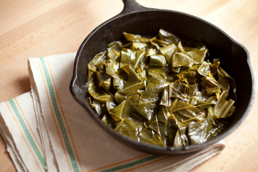 Overhead shot of collard greens in cast iron skillet