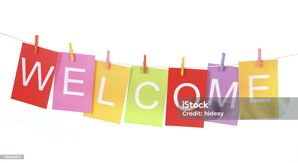 Welcome Welcome spelled out in business cards on washing line on white background Alphabet Stock Photo