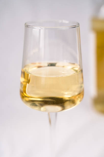 istock A wineglass of white dry wine. Close-up. Selective focus. 1830659497