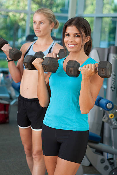 istock Women exercising in a gym 183066071
