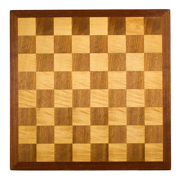 Old wooden chess board on white