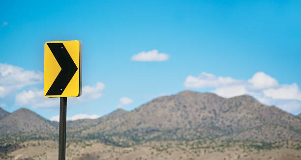 istock arrow sign mountain landscape 183066197